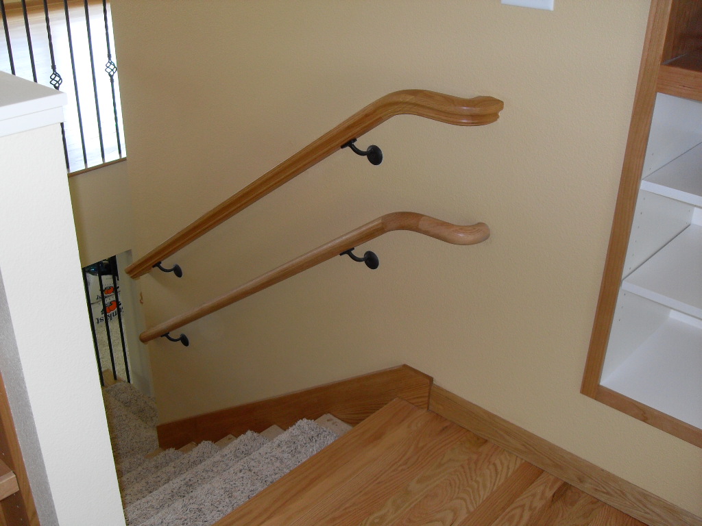 Staircase with two handrails for two different heights