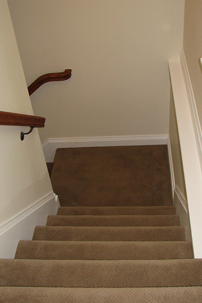 Image of intersection between two staircases known as a landing