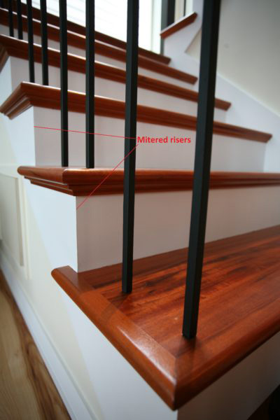 Close up image of staircase highlighting mitered risers